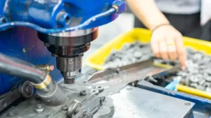 Industrial stamping press featuring a precision punch tool assembly operating on an active metal forming production line